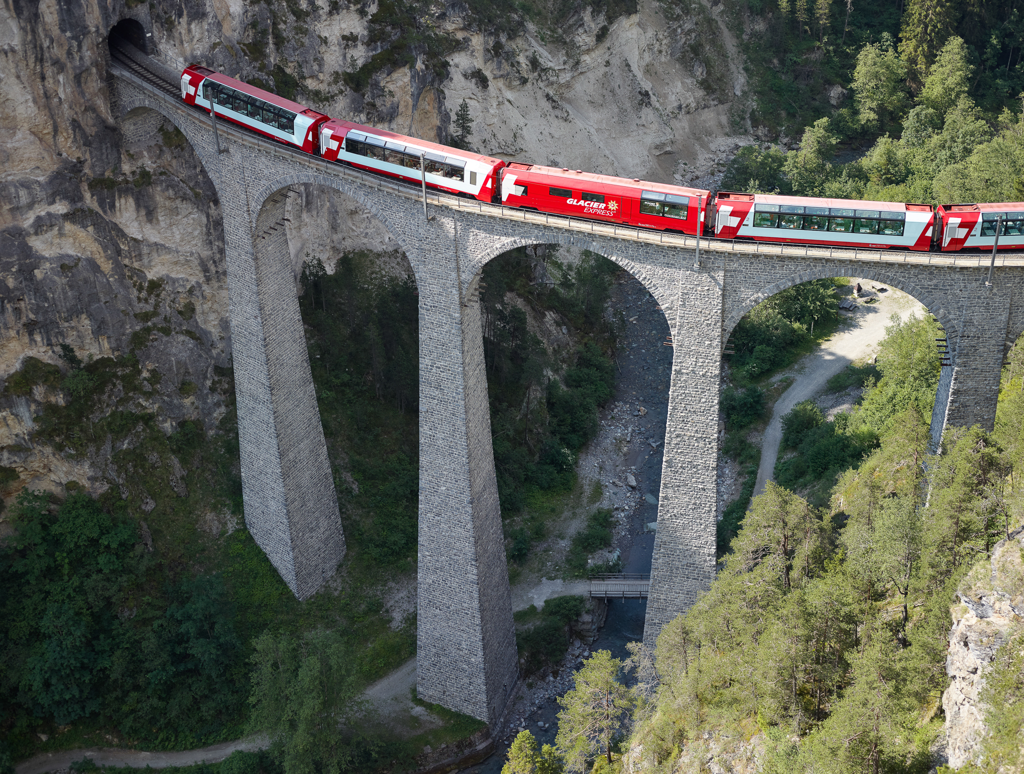 Glacier Express train crossing a bridge on a Switzerland rail tour