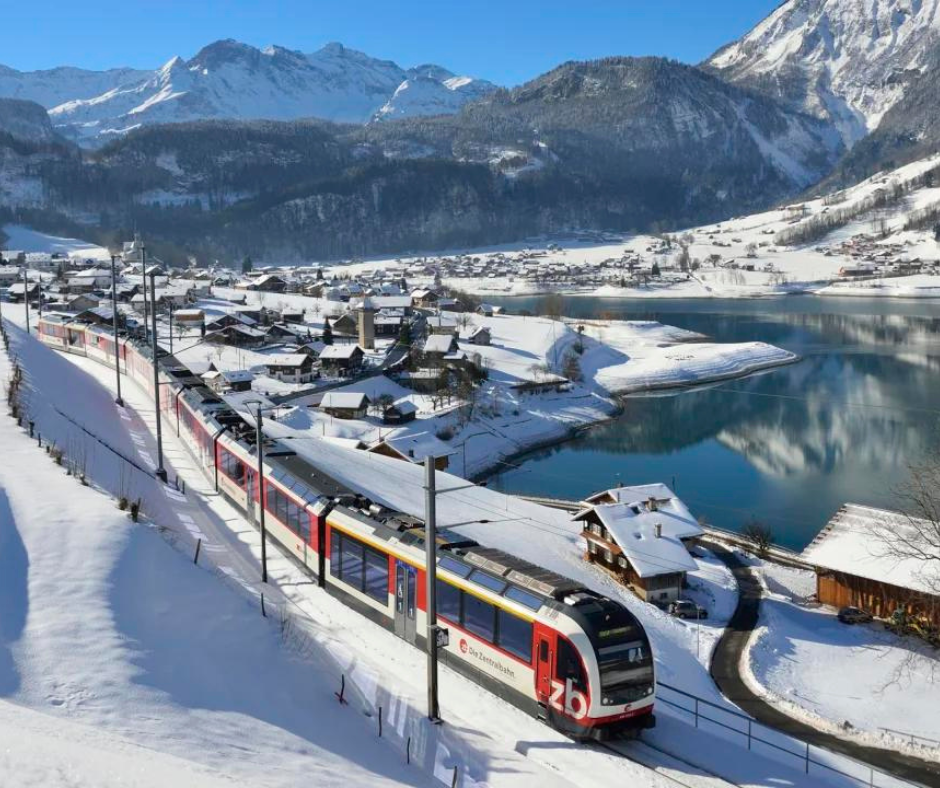 Luzern-Interlaken Express travelling through the snow