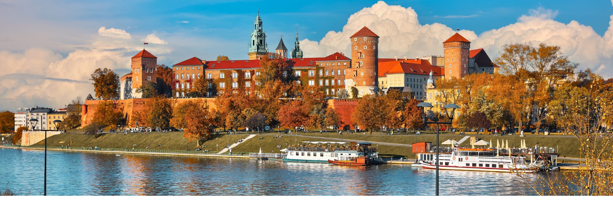 Canal boats docked against the still waters of Eastern Europe riversides