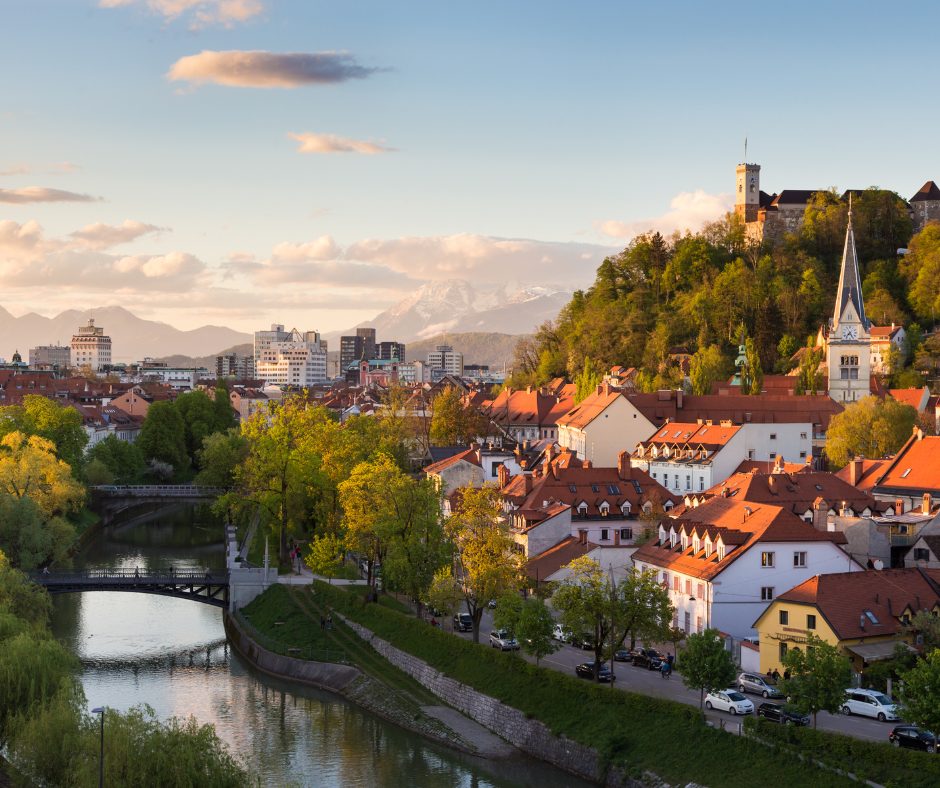 A quiet canal runs through the villages of Slovenia and can be explored on a Slovenia rail holiday