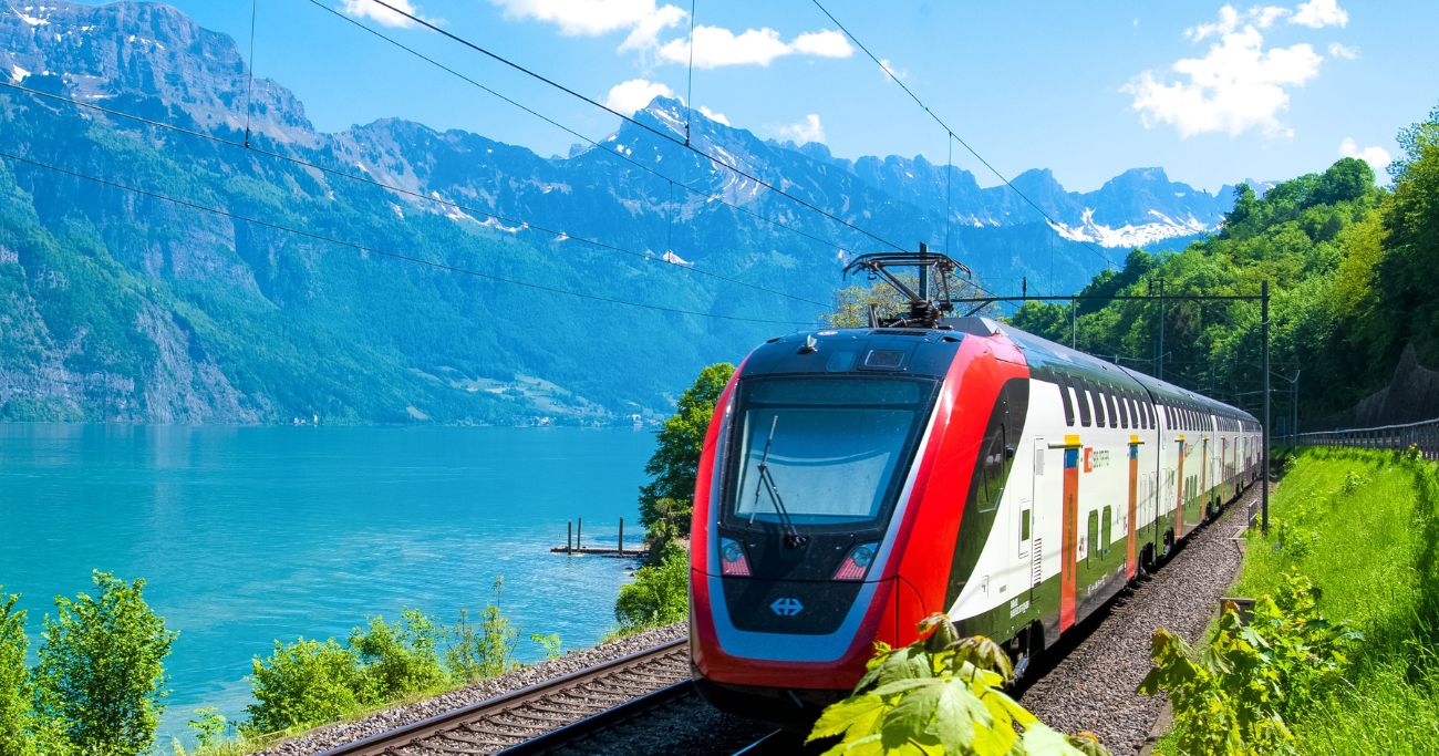Luxury train gliding through the swiss hills on our favourite summer rail holidays