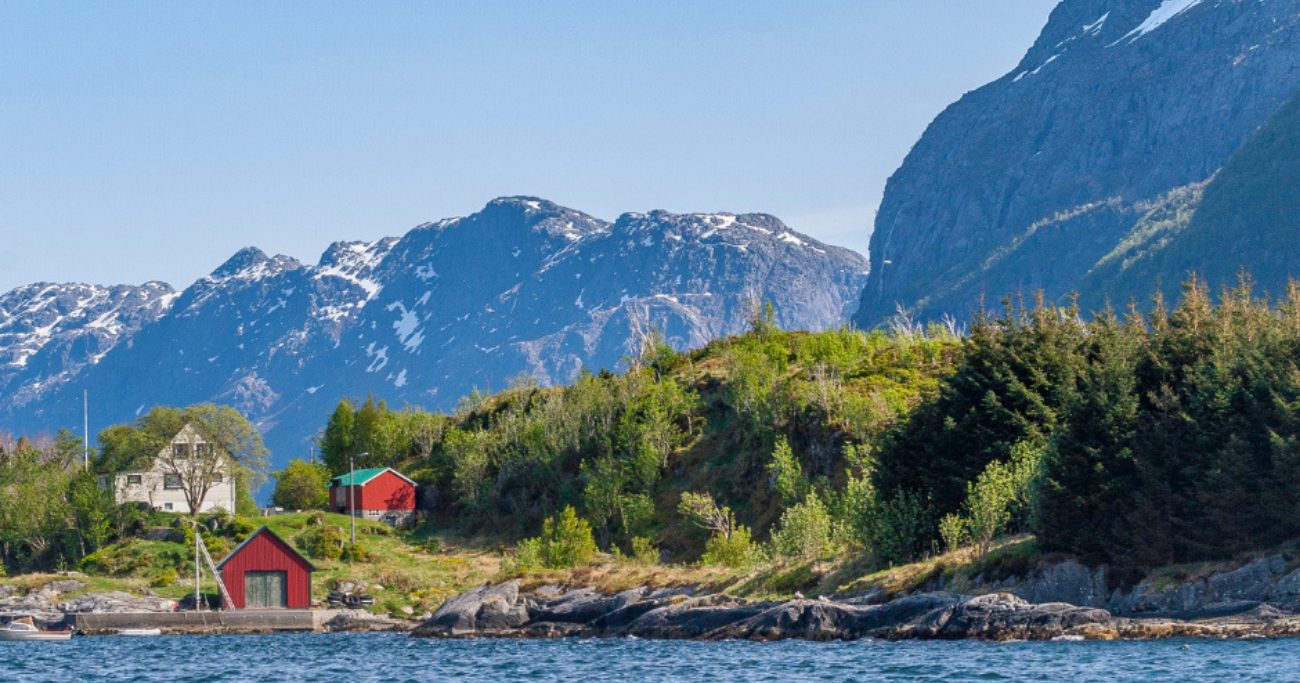 Scenic mountains of Alesund with colorful buildings.