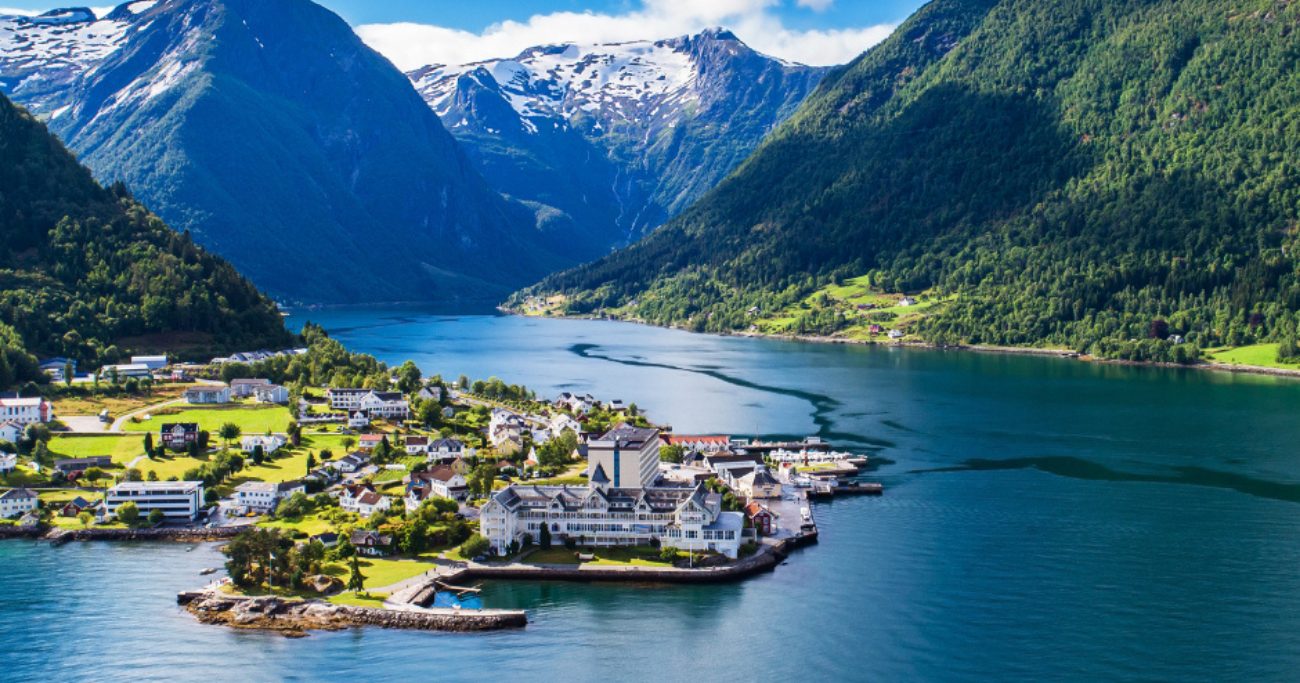 Scenic village of Alesund by a fjord