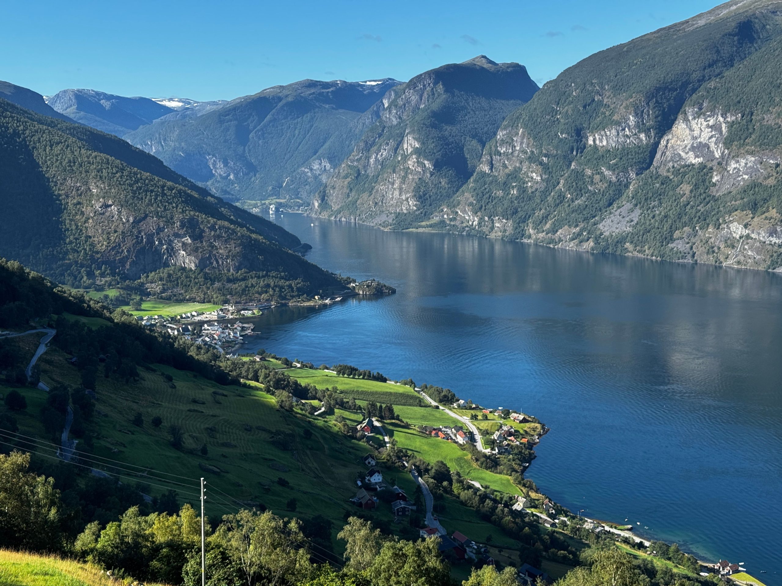 Scenic fjord surrounded by mountains.